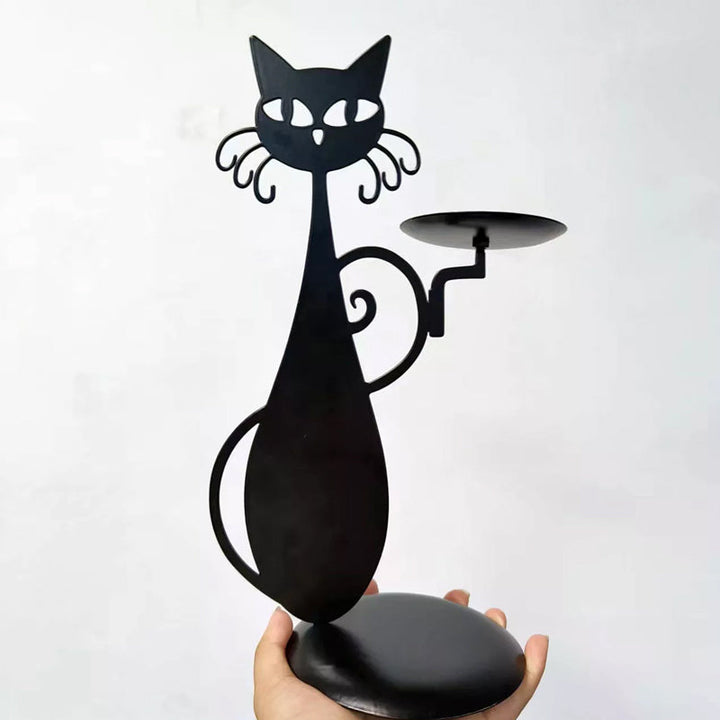 "Svart katt-design ljusstake i metall, handgjord med elegant svart yta, perfekt för heminredning och unik dekoration."