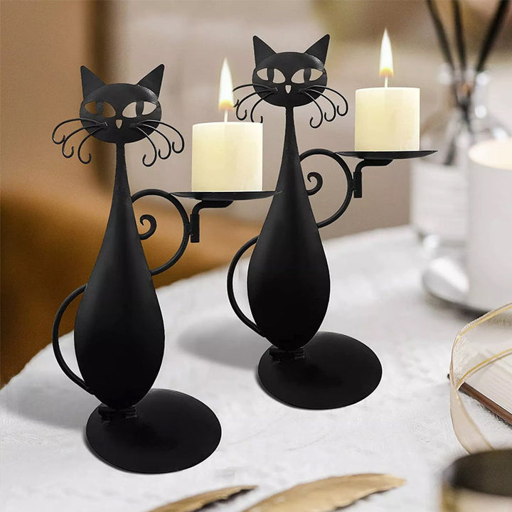 "Svart katt-design ljusstake i metall, handgjord med elegant svart yta, perfekt för heminredning och unik dekoration."