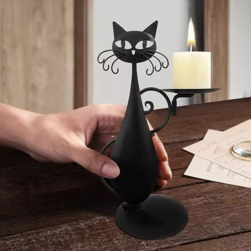 "Svart katt-design ljusstake i metall, handgjord med elegant svart yta, perfekt för heminredning och unik dekoration."