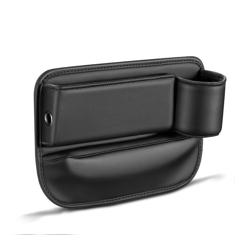 "Svart läderförvaringsbox för bilsätesgapp. Stilren design, enkel installation, förhindrar föremål från att falla ner."