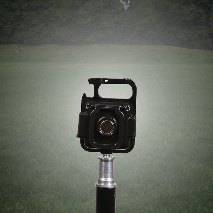 "Svart multifunktionell nyckelring nödljus med kompakt design och 4 ljuslägen, perfekt för utomhusaktiviteter."