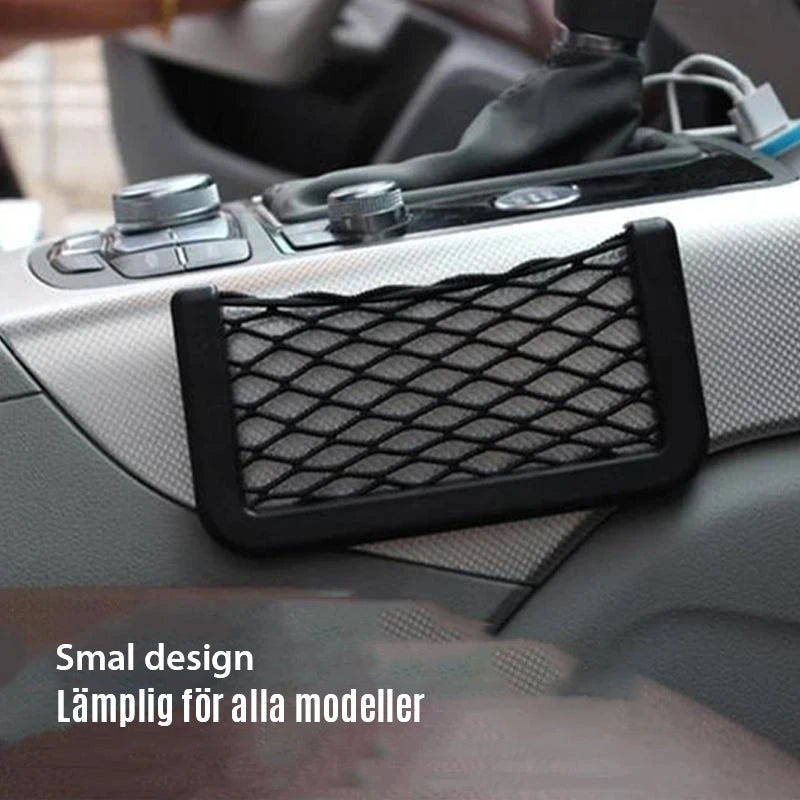 "Svart nätficka för bilens förvaring, elegant design, perfekt för småsaker, enkel installation på dörrsida med tejp."