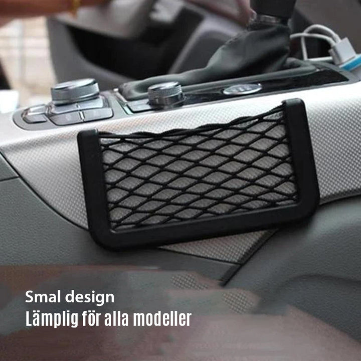 "Svart nätficka för bilens förvaring, elegant design, perfekt för småsaker, enkel installation på dörrsida med tejp."