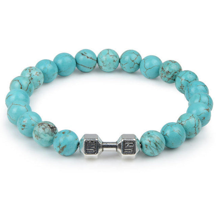 "Svart unisex hantelarmband i onyx och lavasten för chakra, elegant design, naturliga stenar, accessoar för energi och stil."