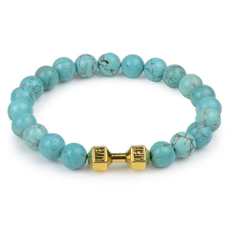 "Svart unisex hantelarmband i onyx och lavasten för chakra, elegant design, naturliga stenar, accessoar för energi och stil."