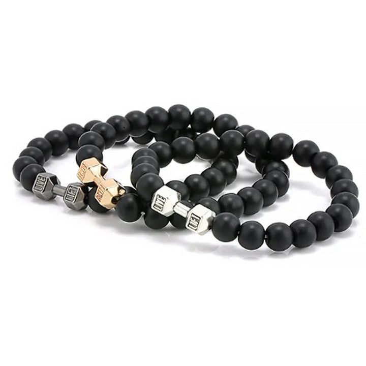 "Svart unisex hantelarmband i onyx och lavasten för chakra, elegant design, naturliga stenar, accessoar för energi och stil."