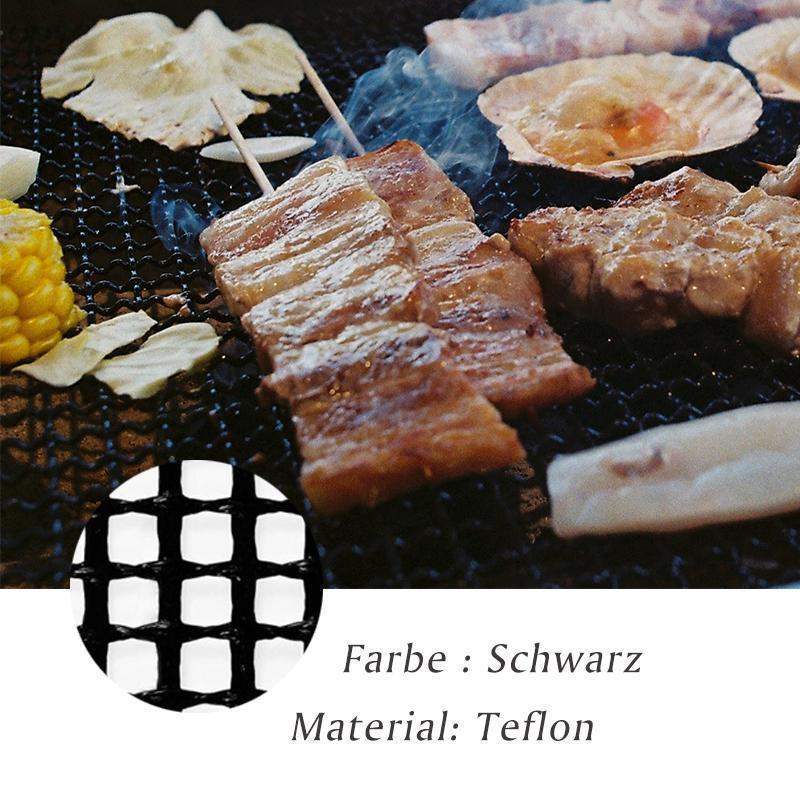 "Svart universell grillmatta, halksäker och värmetålig, 40x33cm, för jämn grillning och skydd mot fallande mat."