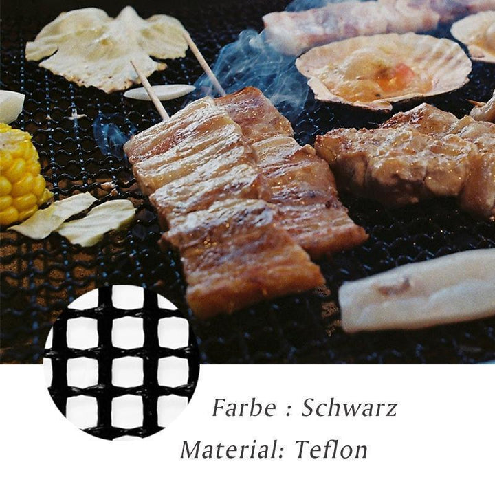 "Svart universell grillmatta, halksäker och värmetålig, 40x33cm, för jämn grillning och skydd mot fallande mat."