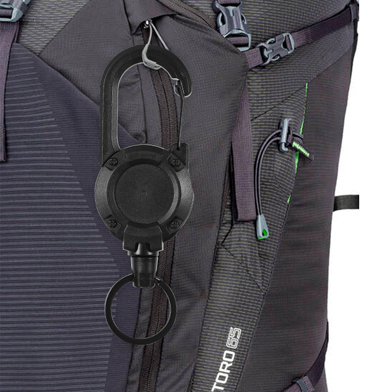 "Svart/vit multifunktionell nyckelring med infällbar vajer, hållbar aluminiumkarbin för utomhusbruk, ca 12,5 cm lång."