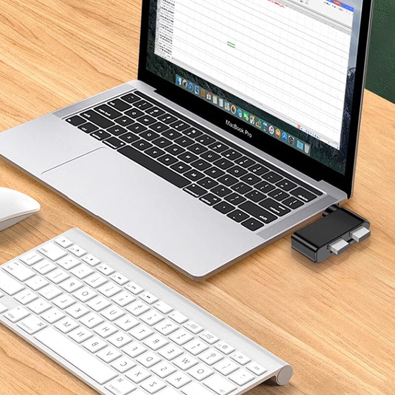 "Svartvit roterbar USB-hubb med 4 portar, idealisk för dator och surfplatta, erbjuder smidig anslutning och 180 graders rotat