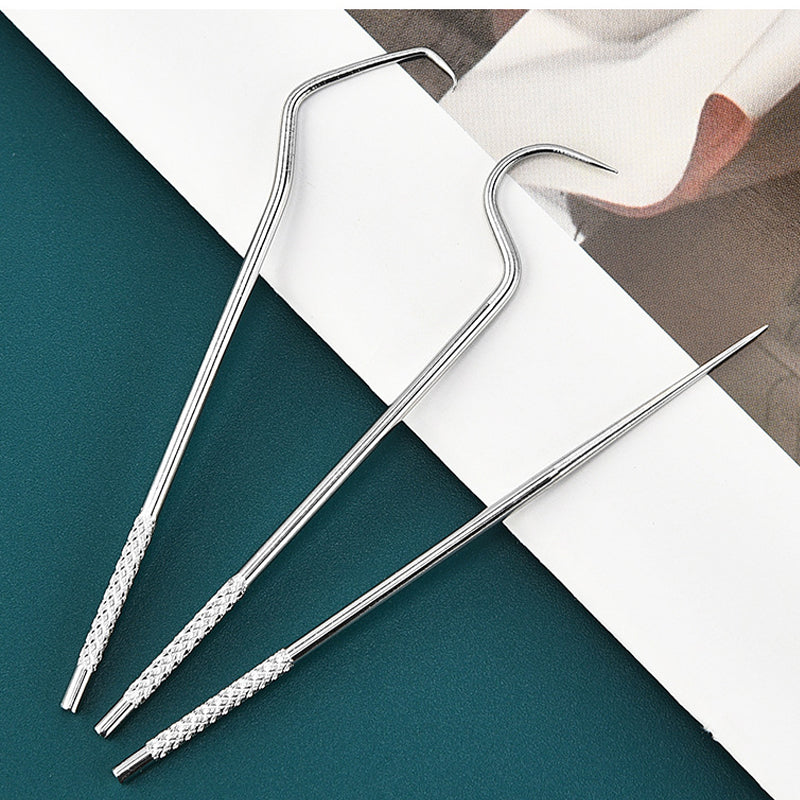 "Tandpetare i rostfritt stål, set om 7. Elegant design och hållbart material för optimal munhygien."