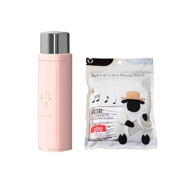 "Tandtrådsdispenser för resor i grön, rosa, vit. Bärbar och kompakt accessoar för enkel användning och påfyllning."