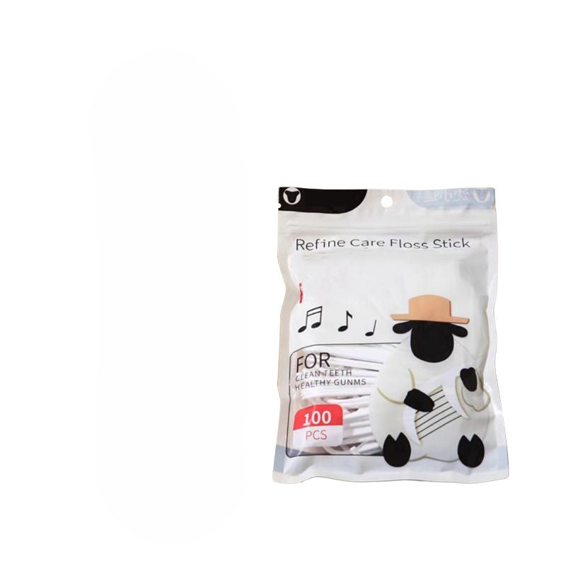 "Tandtrådsdispenser för resor i grön, rosa, vit. Bärbar och kompakt accessoar för enkel användning och påfyllning."