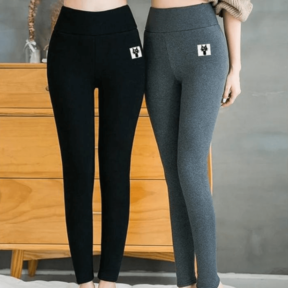 "Tjocka fleecefodrade leggings för kvinnor, svart färg, hög midja, mjuk fleece insida idealisk för vinterkomfort."