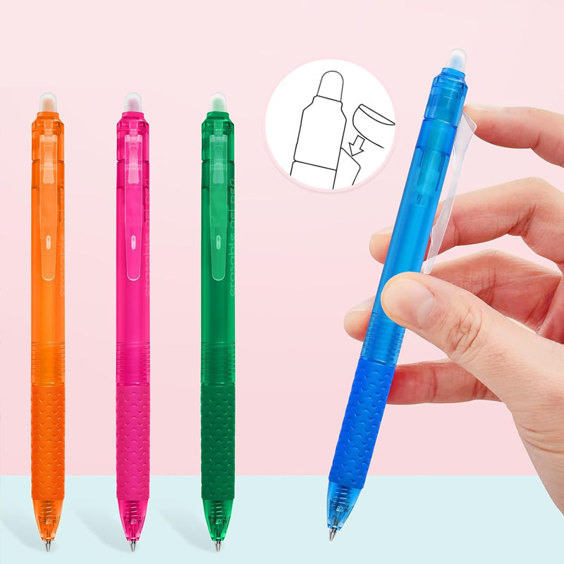 "Top down view of colorful erasable gel pens on white background with visible pen tips and vibrant colors."