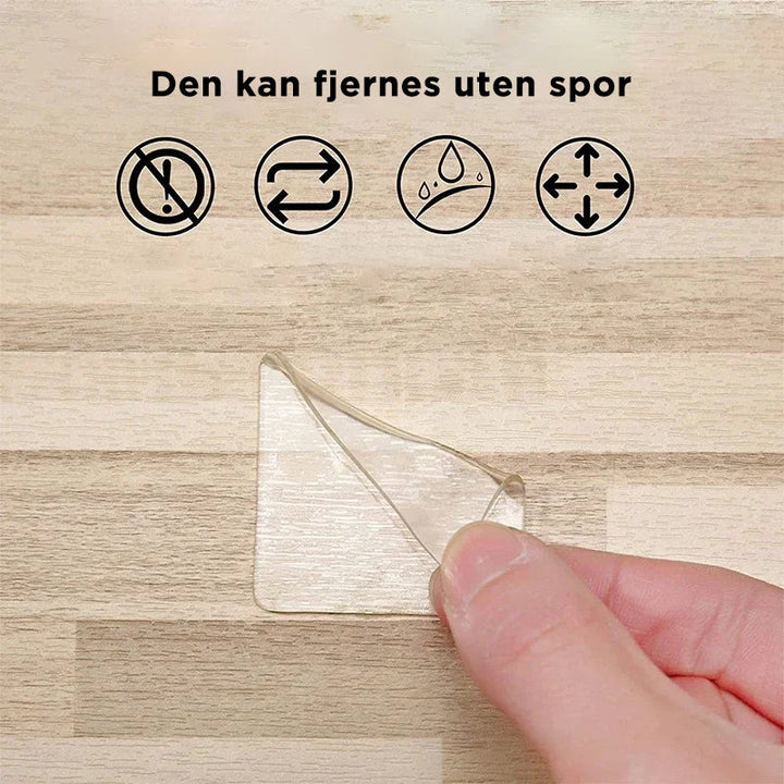 "Transparent återanvändbar dubbelhäftande tejp för släta ytor, idealisk för hem och hobbyprojekt inom DIY."