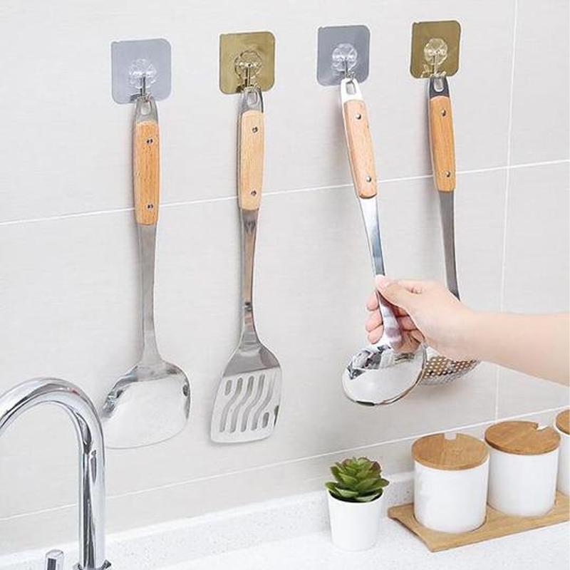"Transparent självhäftande krok i rostfritt stål och PVC, hög lastkapacitet, diskret design, passar varje inredning."