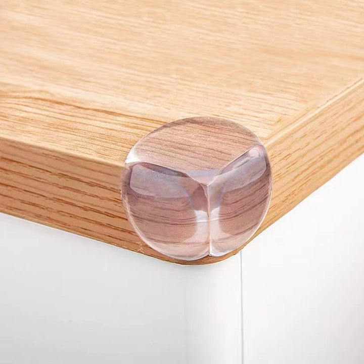 "Transparenta barnsäkerhetsskydd av silikon för bordshörn, mjuka och robusta, perfekta för skarpa kanter i hemmet."