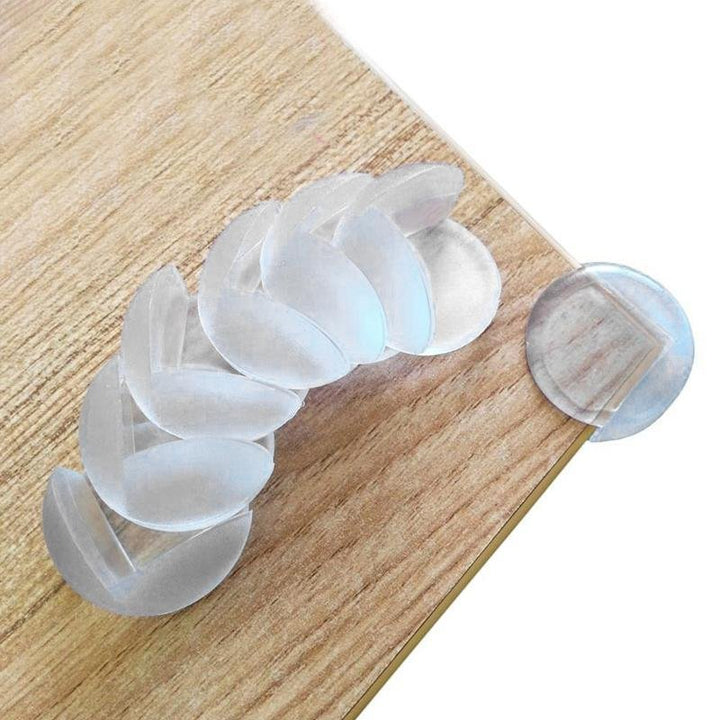 "Transparenta barnsäkerhetsskydd av silikon för bordshörn, mjuka och robusta, perfekta för skarpa kanter i hemmet."