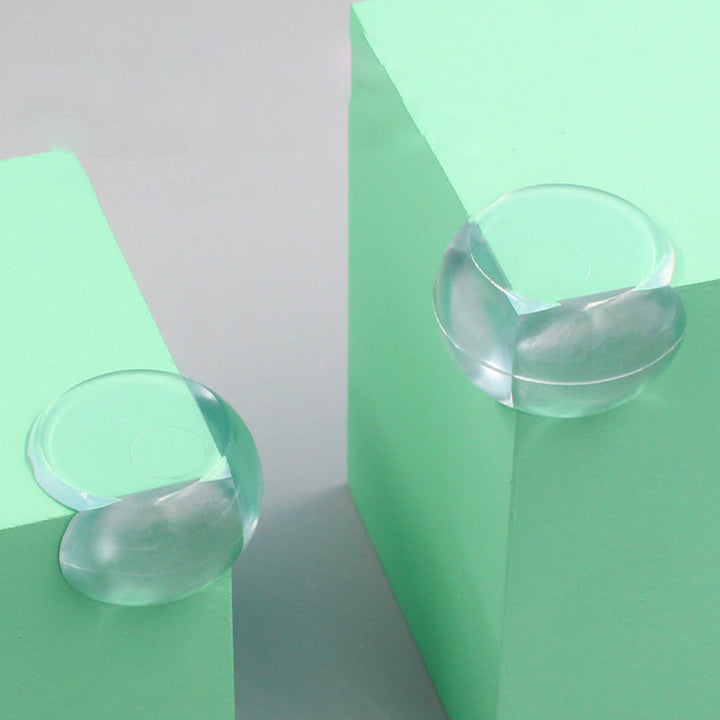 "Transparenta barnsäkerhetsskydd av silikon för bordshörn, mjuka och robusta, perfekta för skarpa kanter i hemmet."