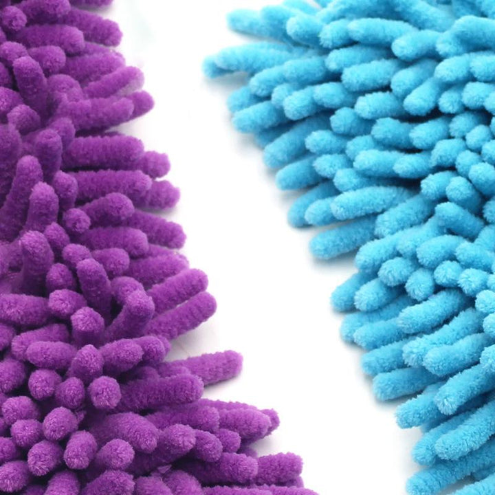 "Triangelformad roterbar mopp med teleskopskaft för effektiv rengöring av alla ytor, justerbar mellan 54-90 cm."