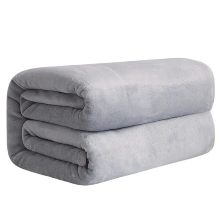 "Ultramjuk korall fleece flanellfilt, enfärgad, idealisk för hemmet. Perfekt som mysfilt, överkast eller sofföverdrag."
