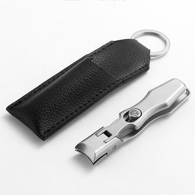 "Ultraskarp nagelklippare i rostfritt stål med modern design, effektiv för tjocka naglar, svart och silverfärg, 9x1.6 cm."