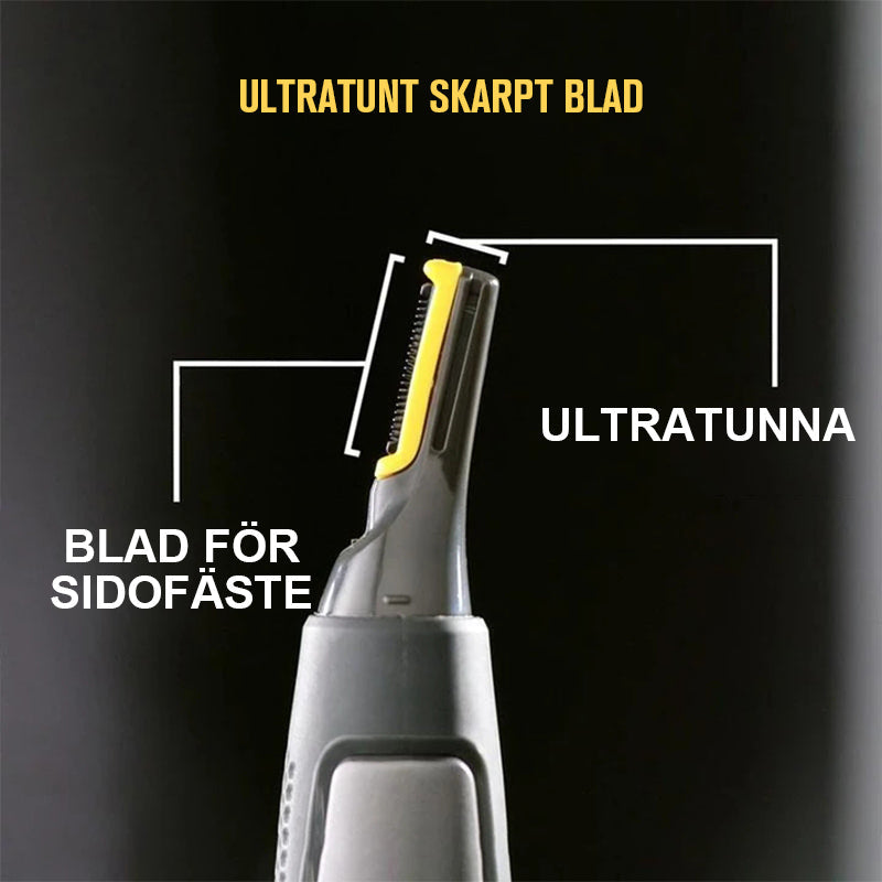 "Ultratunn precisionstrimmer med rostfria stålblad och grått grepp, optimerad för personlig hälsovård, sladdlös och portabel.