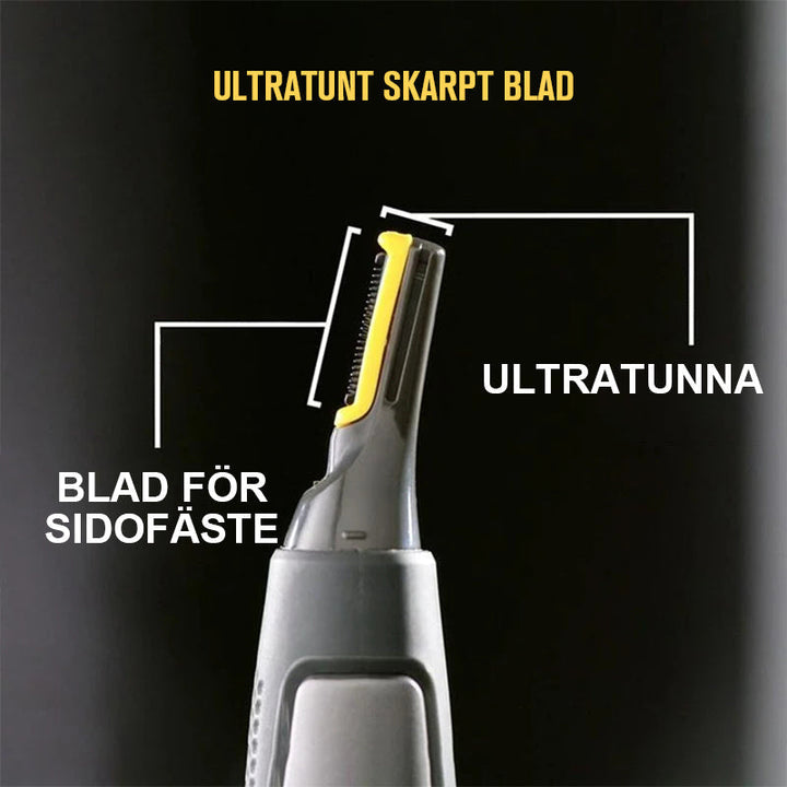 "Ultratunn precisionstrimmer med rostfria stålblad och grått grepp, optimerad för personlig hälsovård, sladdlös och portabel.