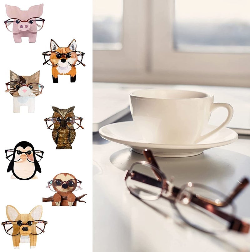 "Unikt trä glasögonställ med djurdesign som corgi och katt, perfekt för hemmet. Dekorativ och funktionell inredningsdetalj."
