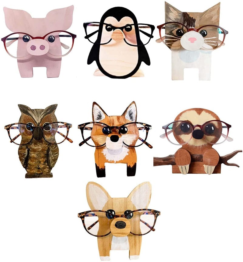 "Unikt trä glasögonställ med djurdesign som corgi och katt, perfekt för hemmet. Dekorativ och funktionell inredningsdetalj."