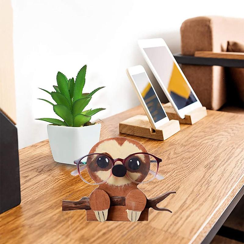 "Unikt trä glasögonställ med djurdesign som corgi och katt, perfekt för hemmet. Dekorativ och funktionell inredningsdetalj."