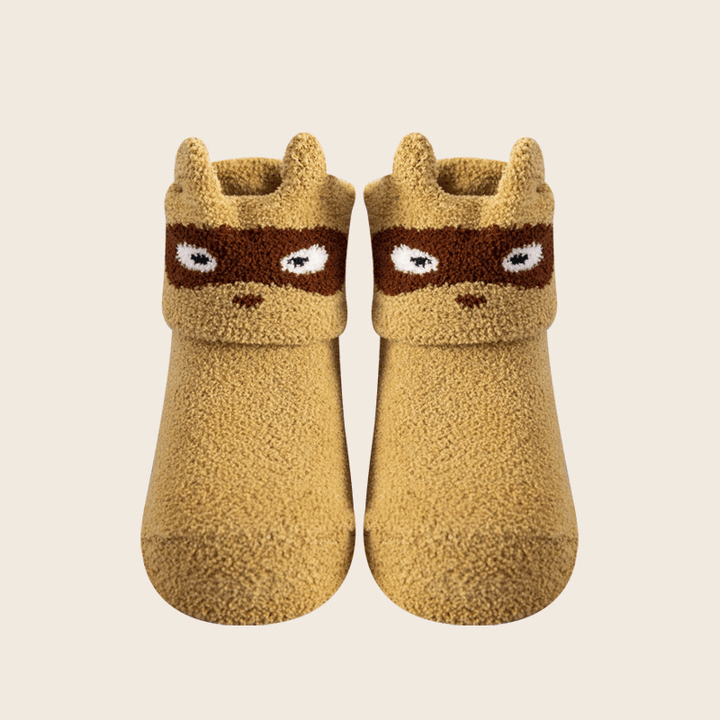 "Unisex baby anti-halk golvstrumpor med färgglada djurmotiv, perfekt för lek på trägolv och släta ytor."