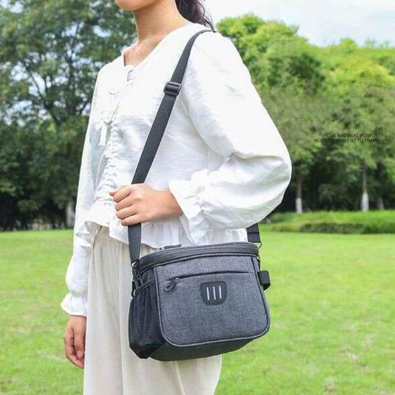 Unisex grå cykelväska med reflexremmar, rymlig design för nödvändigheter, lätt montering, stilren och säker.