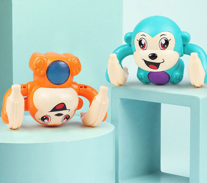 Unisex babyleksak med apa-tema, stimulerar syn och hörsel med sina ljus och melodier.