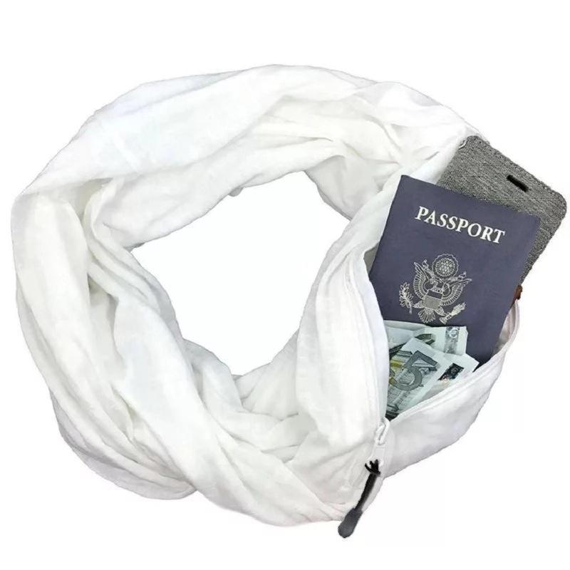 "Unisex vinterljuddämpare med dold ficka, mjukt material, elegant design, flera färger. Perfekt för kyliga dagar."