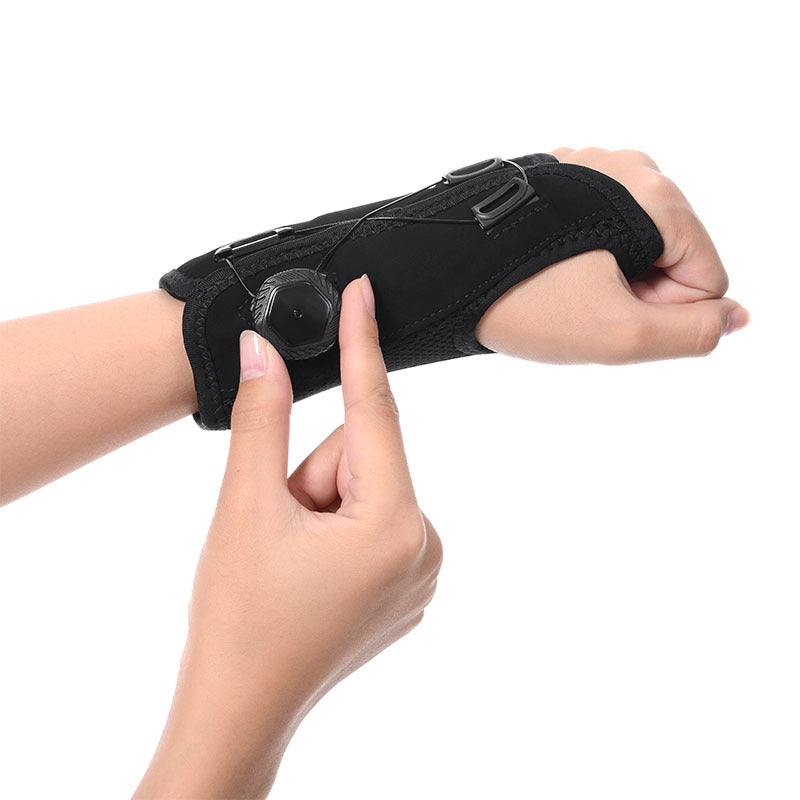 "Unisex vrist stödbandage i grå och svart för sport och träning, med justerbar passform och mikrofibertyg för stöd."