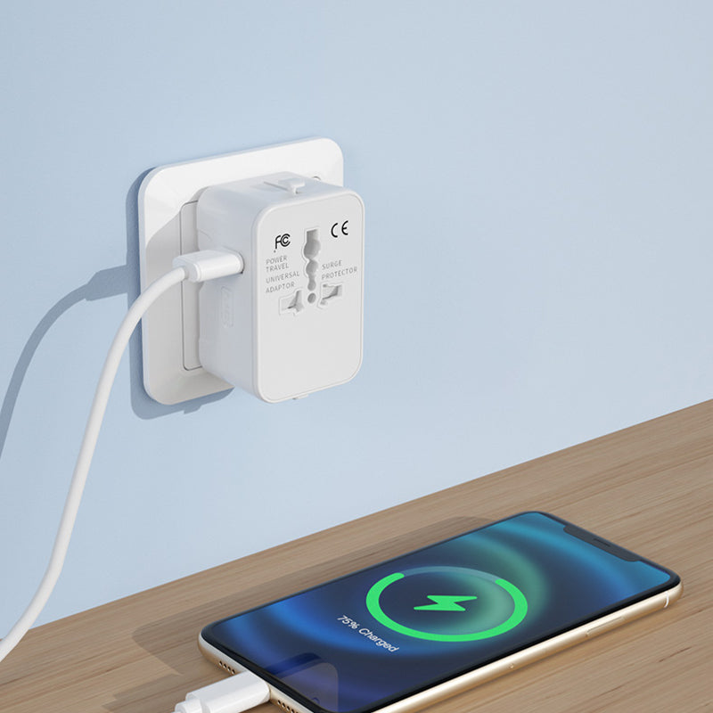 "Universell reseadapter med dubbla USB-portar i flera färger, kompakt design för resa, ladda enheter var som helst."