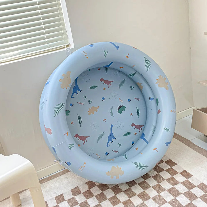 Uppblåsbar baby pool i retrodesign med livliga färger för lek och svalka, diameter 90 cm, höjd 26 cm, silikonmaterial.