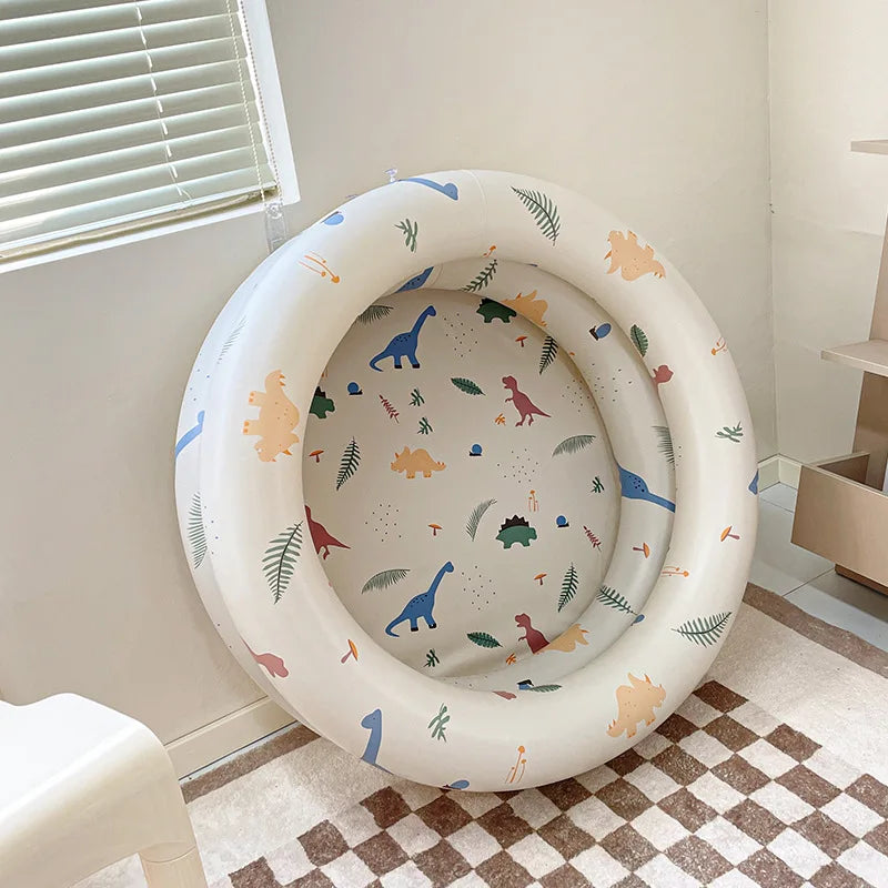 Uppblåsbar baby pool i retrodesign med livliga färger för lek och svalka, diameter 90 cm, höjd 26 cm, silikonmaterial.