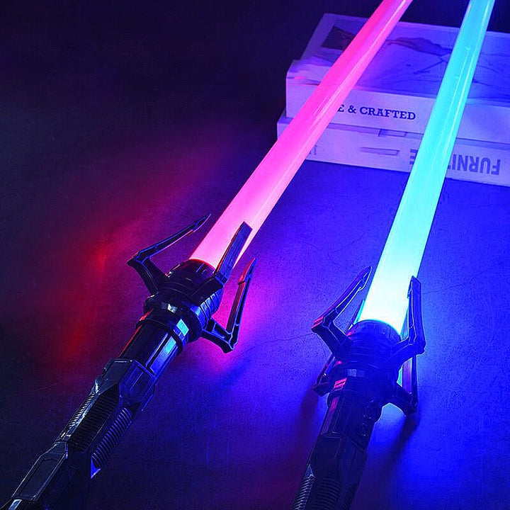 Uppfällbart ljussabel-svärd med realistiska ljuseffekter för cosplay, perfekt för Jedi och Sith fans.