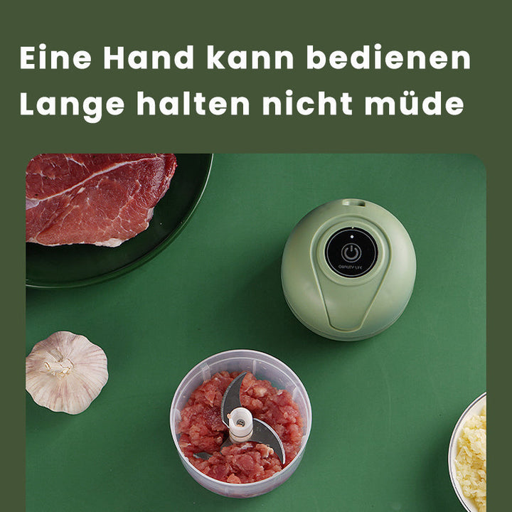 "USB-laddningsbar elektrisk vitlökhackare med kompakt design och rostfritt stålblad, perfekt för köksanvändning."