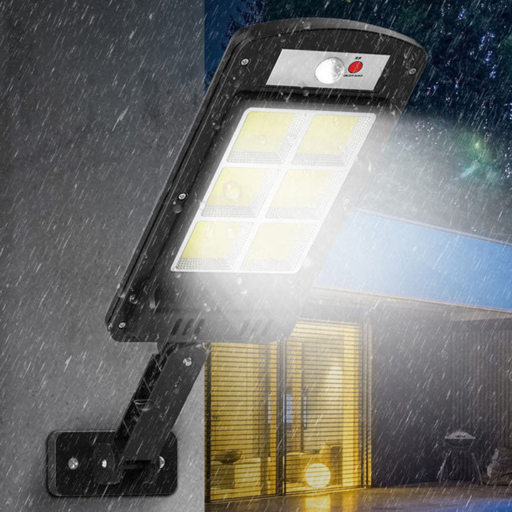 Utomhus LED-sensorlampa för trädgård och uppfart, solcell, hållbar, väderbeständig, stilren vit design, IP65-certifierad.