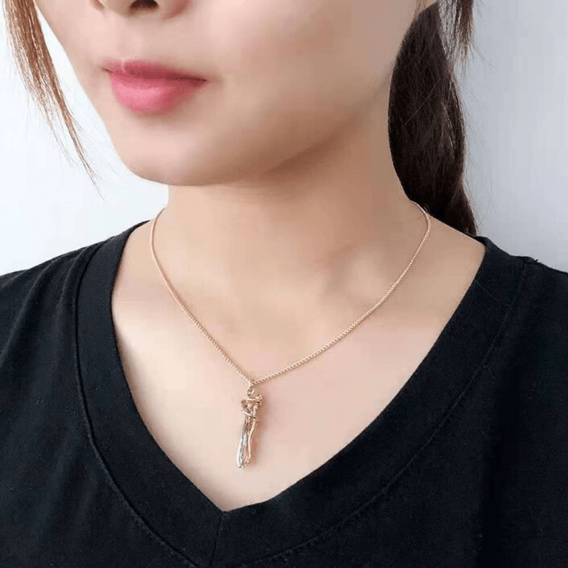 "Vackert par kram halsband i koppardesign, symboliserar evig kärlek och sammanhållning för älskare."