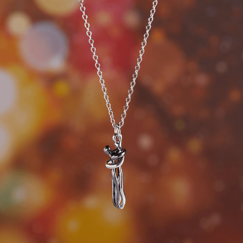 "Vackert par kram halsband i koppardesign, symboliserar evig kärlek och sammanhållning för älskare."