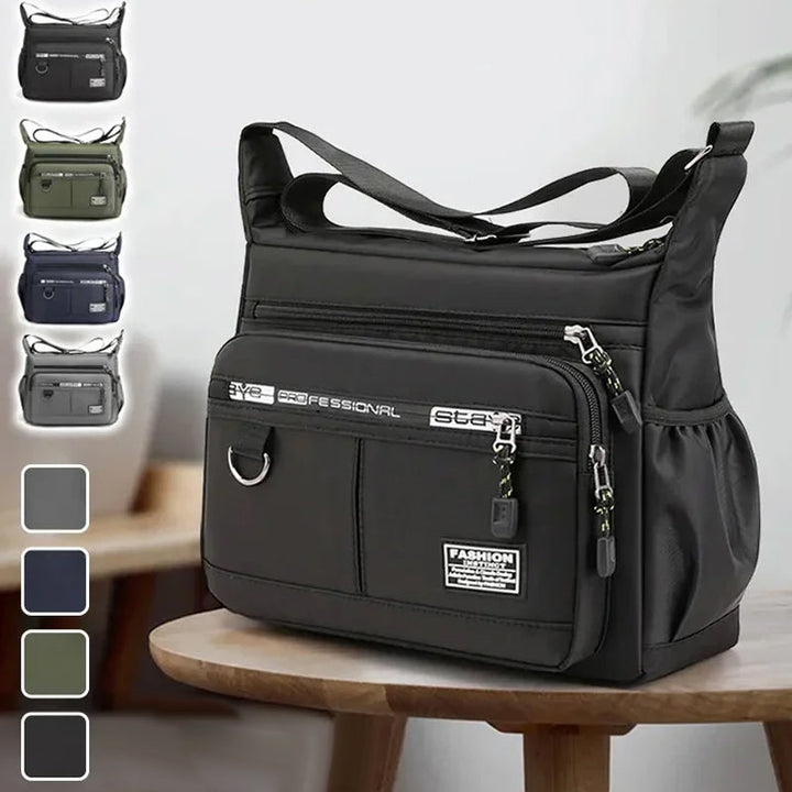 "Vattentät axelväska i slitstark nylon, crossbody design för utomhus och vardag, unisex."
