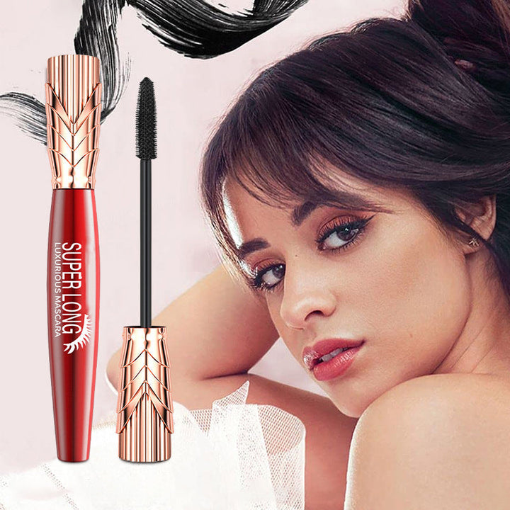 "Vattentät och svettsäker 4D mascara med borste för omedelbar volym. Långvarig, intensiv svart färg för dramatisk look."