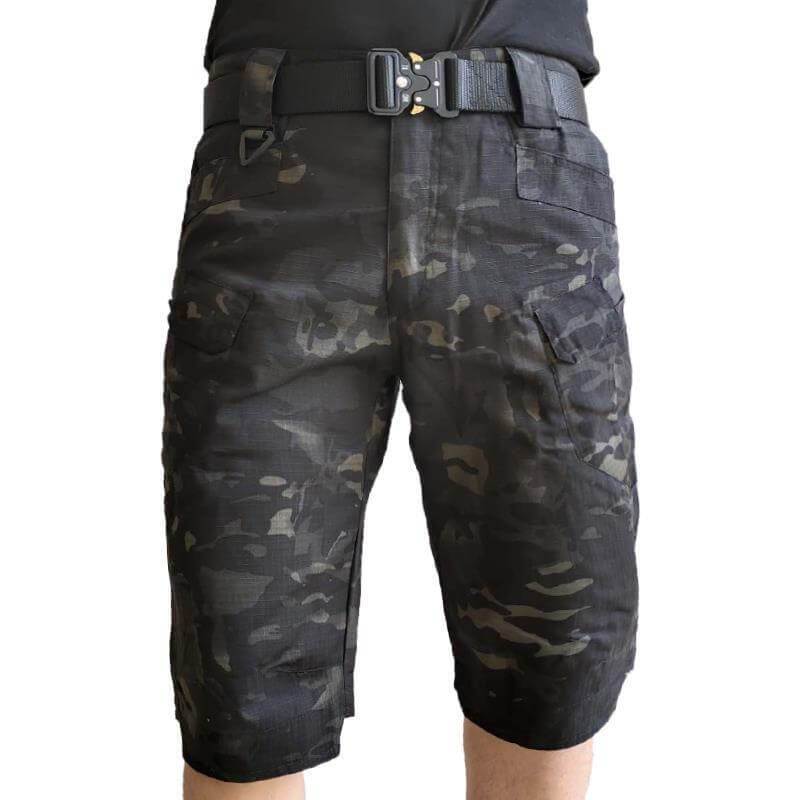 "Vattentäta taktiska shorts för män, mångsidiga färger, elastiskt band och flera fickor för äventyr utomhus."