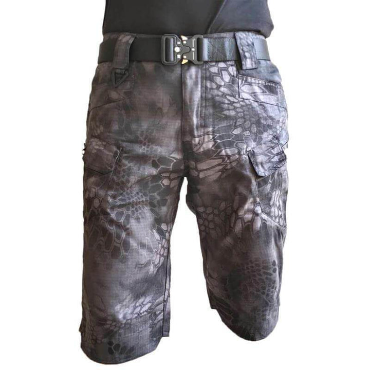 "Vattentäta taktiska shorts för män, mångsidiga färger, elastiskt band och flera fickor för äventyr utomhus."
