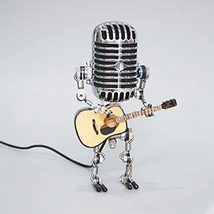 "Vintage mikrofon robotlampa av metall, retrodesign med justerbara leder, perfekt för unik heminredning."